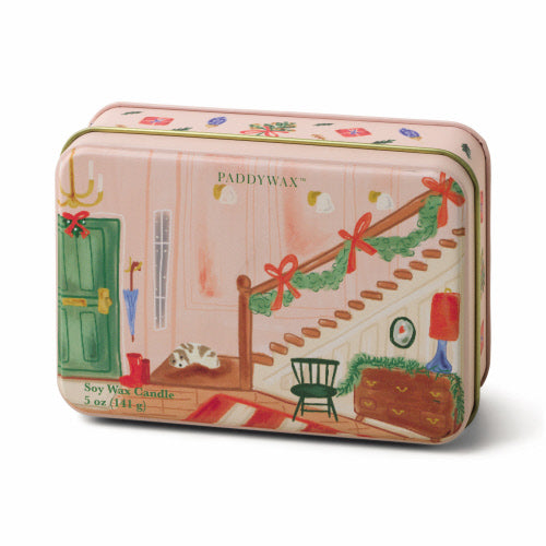 Paddywax candle tin with Christmas-themed design on a white background
