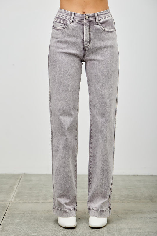 Gray jeans on a women with a white background