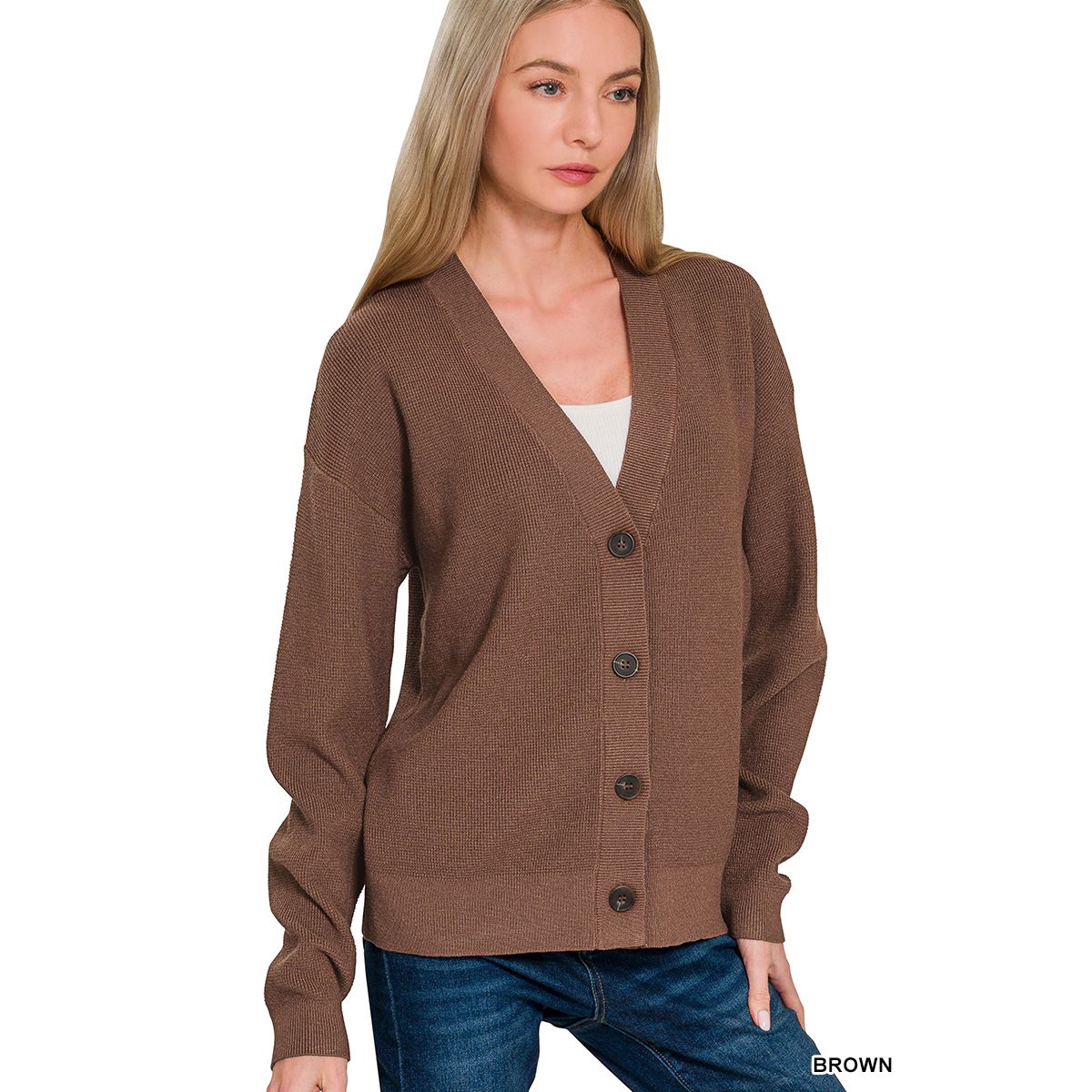 Woman wearing a brown cardigan on a white background