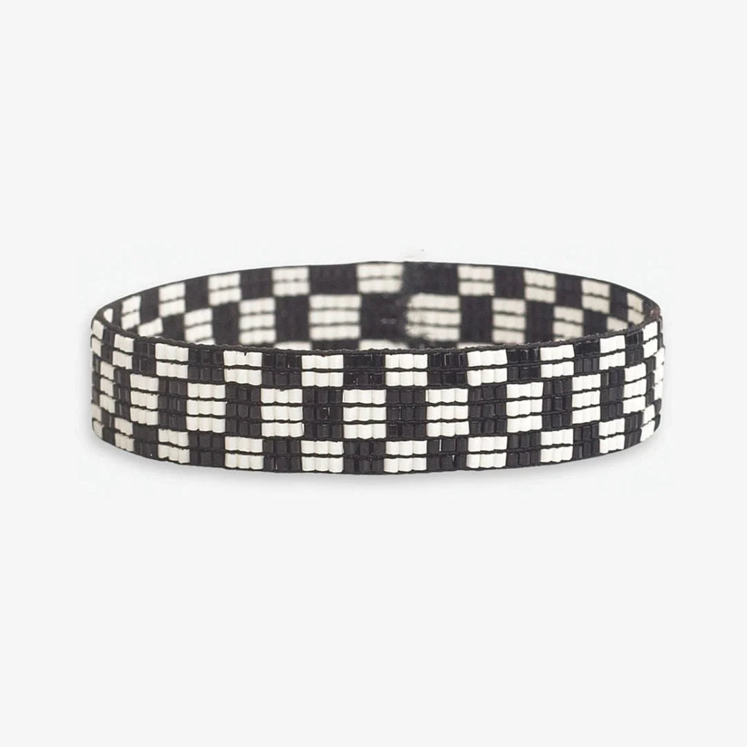 Black and white checkered bracelet on a white background