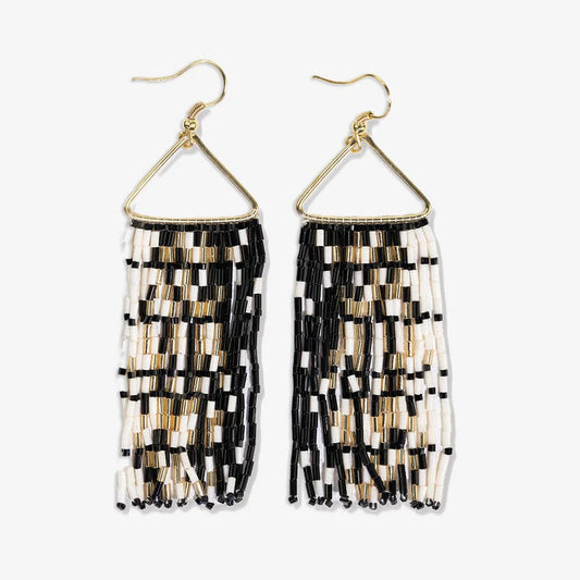 Beaded earrings with black, gold, and white pattern on a white background