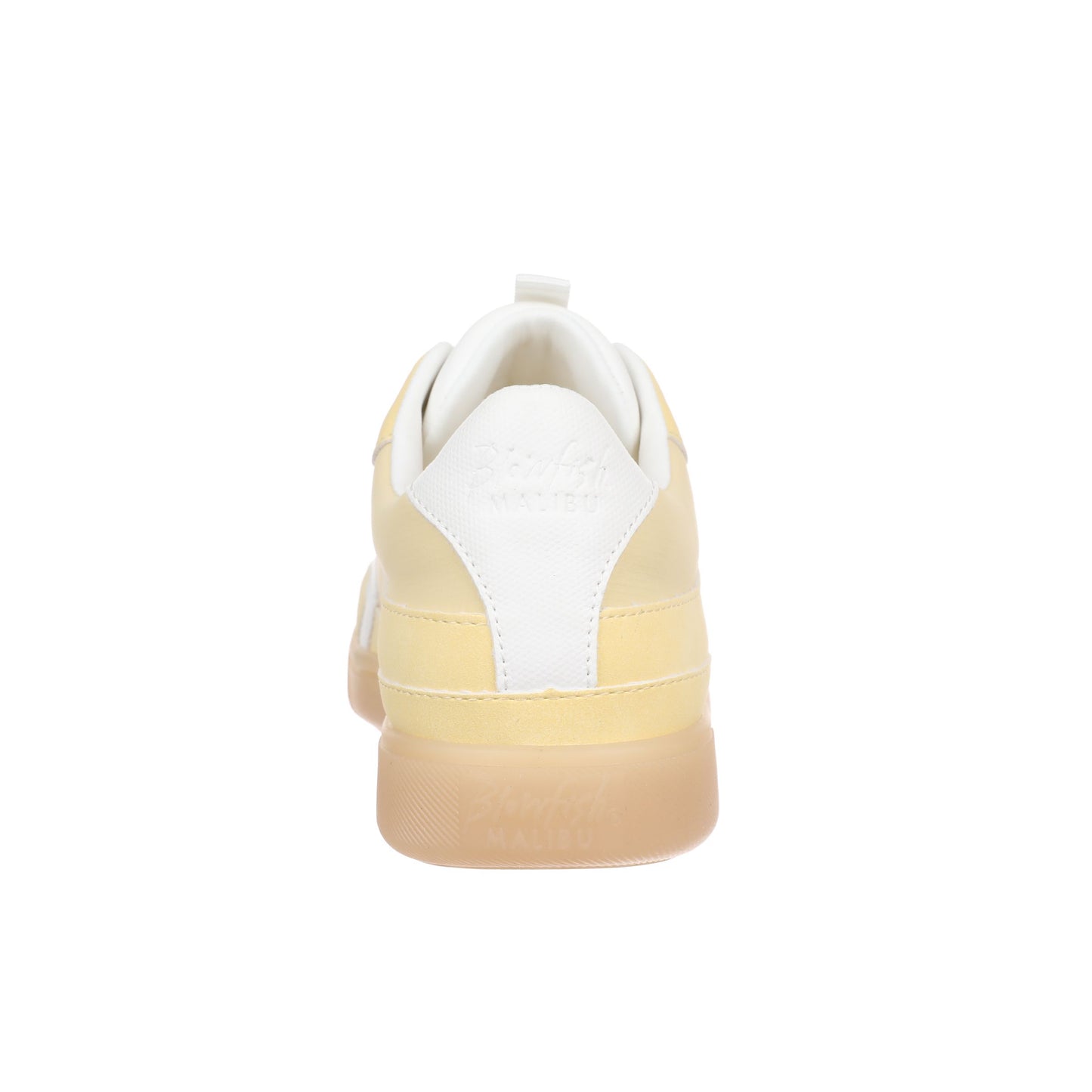 White and yellow sneaker on a white background